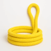 Coiled yellow PP Pro Moor double braid polypropylene rope with an upright loop on a white background.